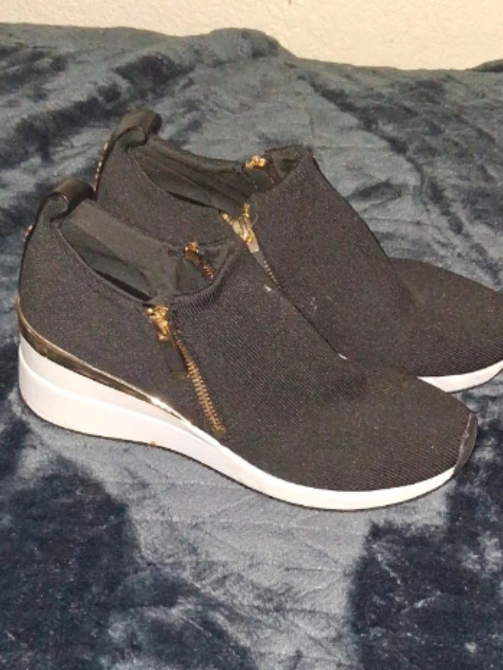 DKNY Black Slip-On Wedge Sneakers with Gold Trim